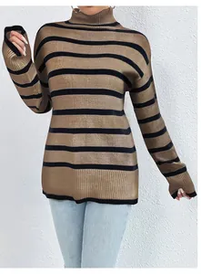 Detailed shot of woman in brown and black striped high-neck slim-fit knit sweater.