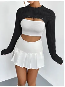 Close-up of black ribbed long sleeve knitted bolero shrug with distressed hem detail