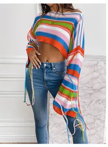 Cropped rainbow striped knit sweater with tassel details and wide sleeves for women.