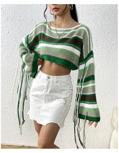 Detail showing green striped cropped knit sweater featuring long fringe sleeves detail
