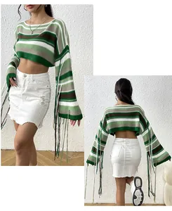 Stylish green striped cropped knit sweater with sleeve tassels and white mini skirt