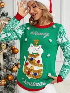 Pull de Noël vert festif avec motif chat à paillettes et lettrage Meowy Christmas.