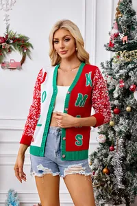 Detailed view of women's V-neck Christmas cardigan with snowflake and XMAS jacquard