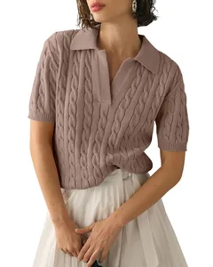 Detailed macro view of a mauve short-sleeve cable-knit polo sweater for women