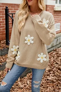 Casual beige oversized knit sweater featuring 3D white crochet flower appliques for women