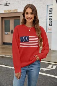 Detailed view of a fashionable women's red crew neck sweater with US flag pattern