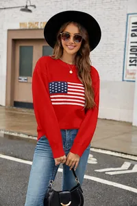 Detailed view of women's red round neck sweater with a stylish American flag pattern on front