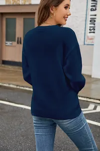 Elegant navy blue round neck knitted sweater for women shown from the back view