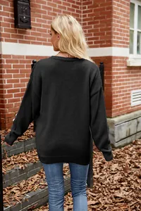 Elegant back view of a loose black knit sweater featuring 3D floral crochet sleeves