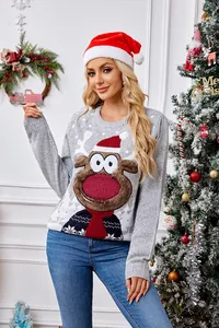 Close-up of gray knitted Christmas sweater featuring a plush reindeer motif