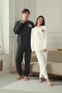Cozy plush couple loungewear set with embroidered numbers for autumn and winter comfort.