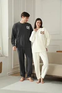 Cozy half-velvet couple pajama set with textured numbers for winter home comfort