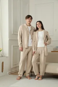 Cozy minimalist couple's loungewear set with V-neck cardigan and matching pants