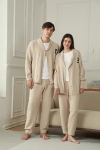 Cozy minimalist V-neck couples loungewear set with beige cardigan and soft pants