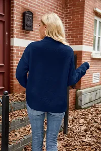 Back view of a navy blue casual oversized knitted sweater with honeycomb texture