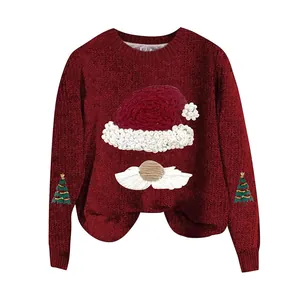 Detail view of festive Santa hat and beard embroidery on a red knit Christmas sweater