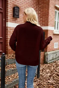 Back view detail of a burgundy textured knit sweater with casual pullover design