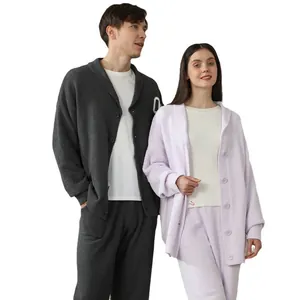 Minimalist couple loungewear set featuring V-neck cardigans in stylish grey and lavender purple.