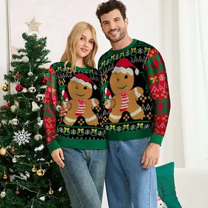 Détail rapproché de pulls de Noël tricotés avec motif bonhomme de pain d'épices.