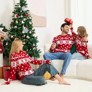 Family Christmas sweaters with red and white reindeer and snowflake knit patterns