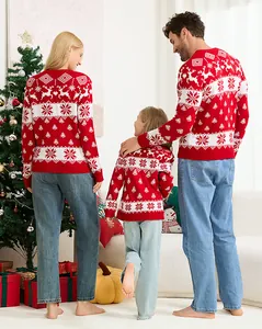 Back view of matching red Christmas sweaters with reindeer patterns for a family of three