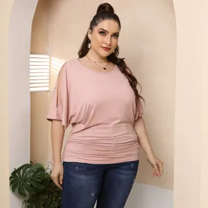 Plus size pink t-shirt for women featuring batwing sleeves and cold shoulder cut-outs