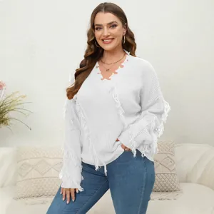 Elegant plus size white V-neck knit sweater featuring distressed neckline and fringe tassels