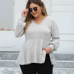 Elegant plus size grey V-neck ribbed knit top featuring lantern sleeves and babydoll hem design