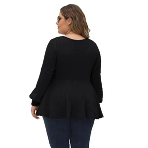 Stylish women's plus size black ribbed peplum top with lantern sleeves for autumn wear