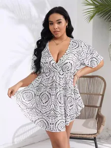 Plus size deep V-neck summer beach cover-up with abstract print and irregular hem