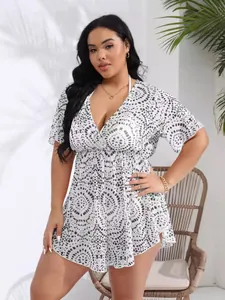 Plus size women's deep V-neck summer beach cover-up dress with black and white dotted prints