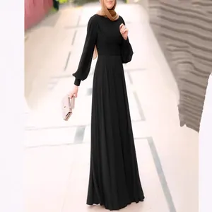 Full-length elegant black maxi dress featuring modest design and pleated puffy sleeves