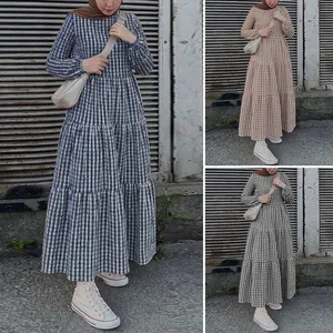 Detail view of checkered puff sleeve tiered maxi dress showing multiple color options