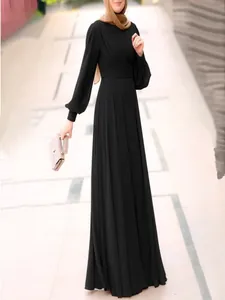 Elegant black puff sleeve maxi dress with pleated bodice and flowing skirt for women