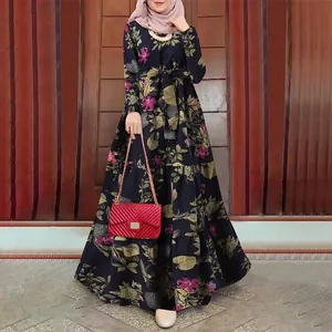 Detailed full-length view of elegant long sleeve floral print maxi dress with waist tie.