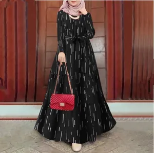 Bohemian black long sleeve maxi dress with white vertical stripe print and waist belt