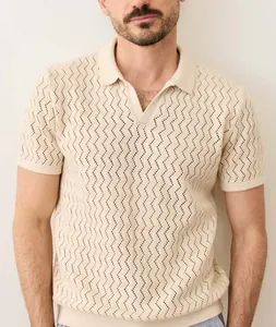 Detailed view of men's breathable knitted polo shirt featuring a zigzag hollow-out pattern
