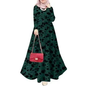 Robe longue vintage à fleurs vert foncé avec manches longues et une ceinture assortie