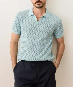 Detailed close-up showing the premium hollow chevron knit texture of this men's polo shirt