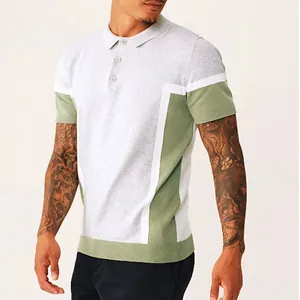 Close-up detail of men's summer knit polo shirt with olive green and grey color block design.