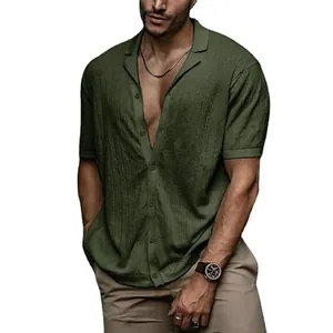 Close-up of army green knitted short-sleeve cardigan with vertical textured pattern