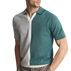 Close-up detail of a men's contrast color-block knit polo shirt in grey and teal green
