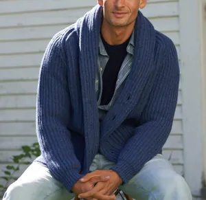 Macro view of a classic blue ribbed knit shawl collar cardigan for men's fashion