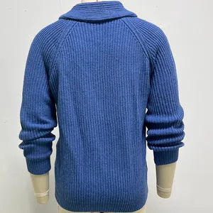 Detailed back view of a men's blue ribbed knit shawl collar sweater on mannequin