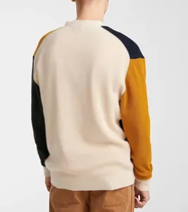 Back view of a men's color-block knit cardigan in beige and mustard yellow tones.
