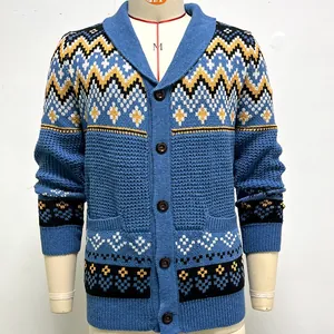 Detail view of blue men's knitted cardigan with geometric jacquard patterns