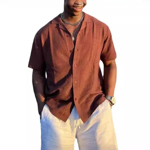 Men's brown knit short sleeve polo shirt with textured pattern and lapel collar