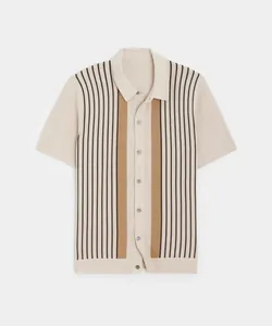 Close-up of a men's short-sleeved knitted polo shirt with brown vertical stripes.