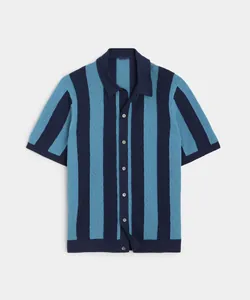 Close-up of a blue striped knit polo shirt with breathable hollow texture.