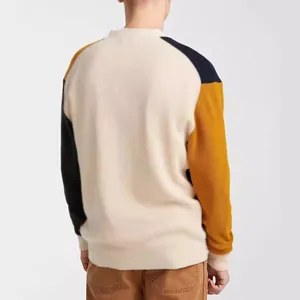 Men's color-block crew neck knit sweater with beige and mustard yellow panels back view
